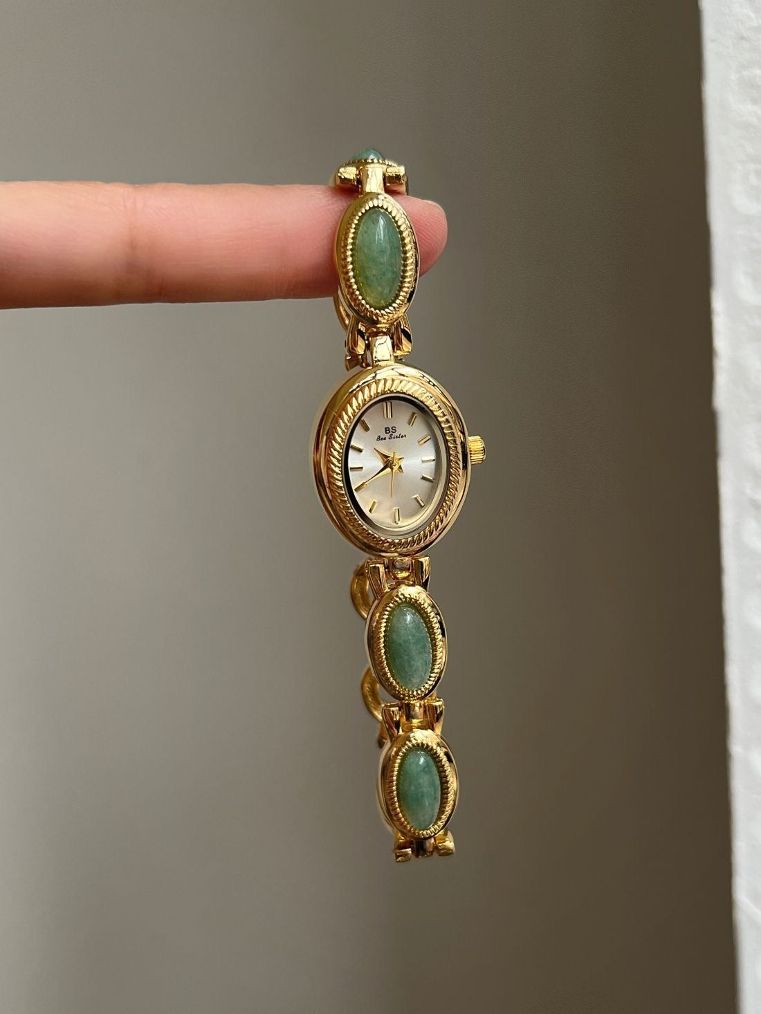 Vintage Rado Gold-Tone Watch with Emerald Accents – Timeless Elegance