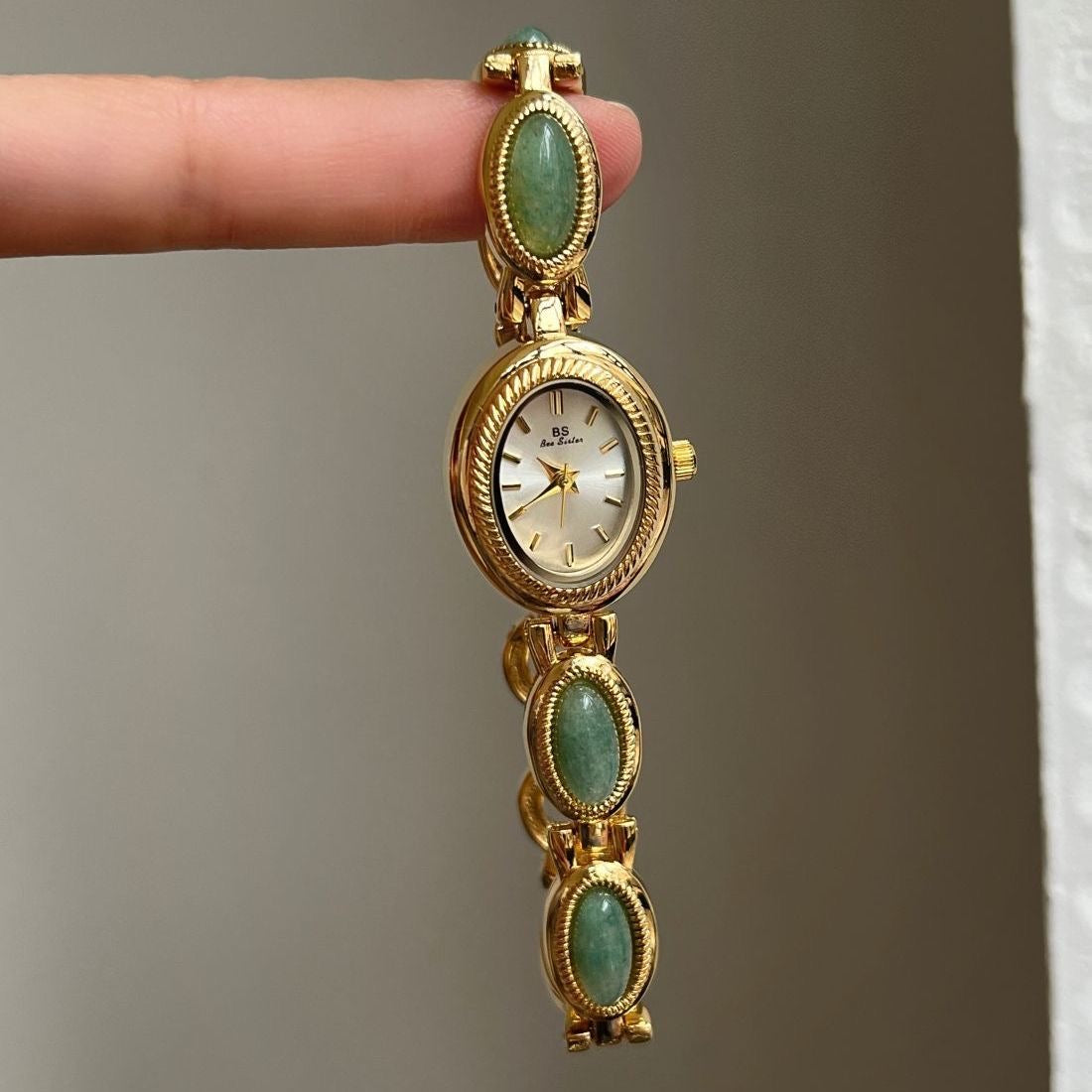 Vintage Rado Gold-Tone Watch with Emerald Accents – Timeless Elegance