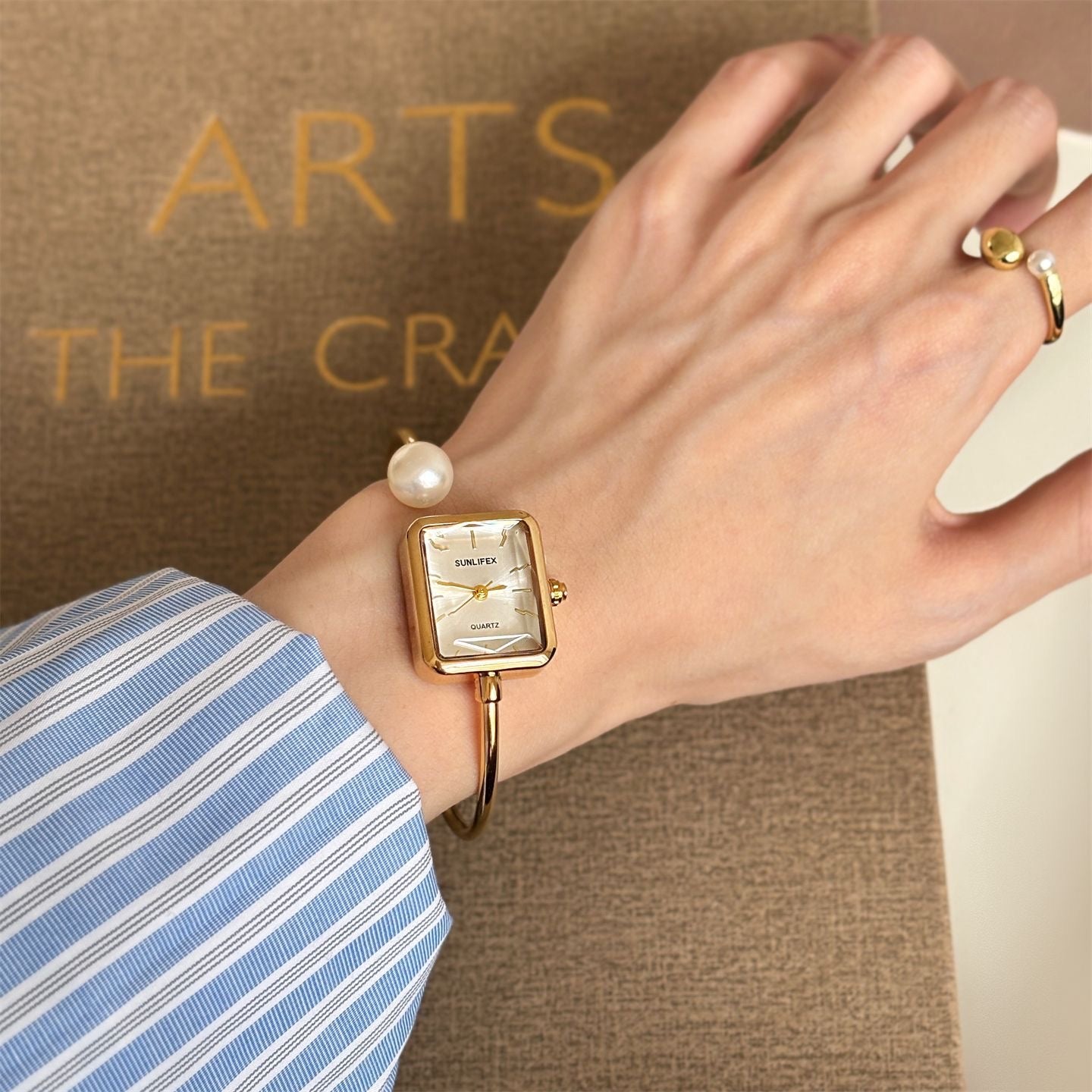 SUNLUX Square Women’s Bangle Watch – Gold-Tone Case with Pearl Accent & Pearlescent Dial