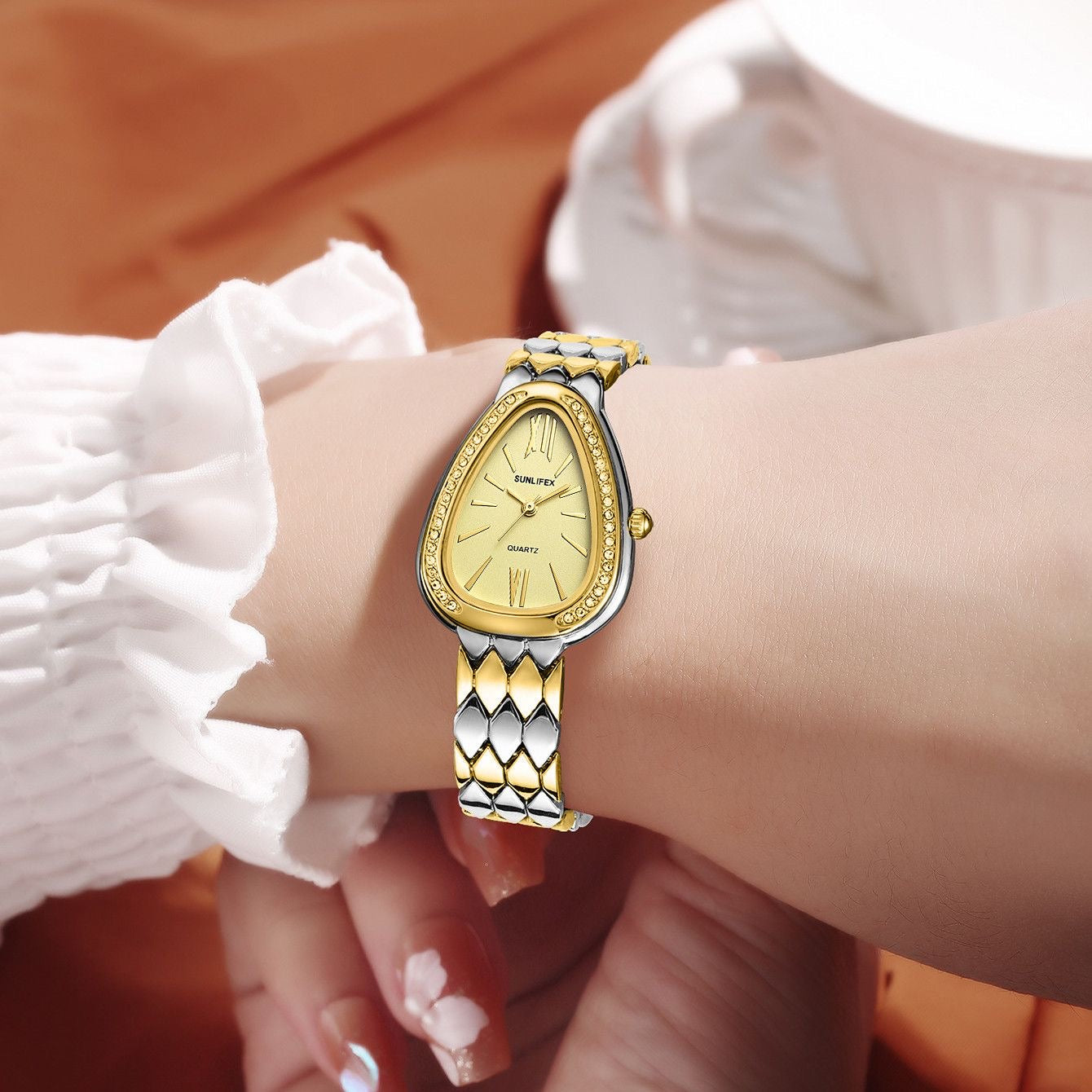 SUN-FLEX Teardrop Quartz Watch – Dual-Tone Elegance with Crystal Bezel