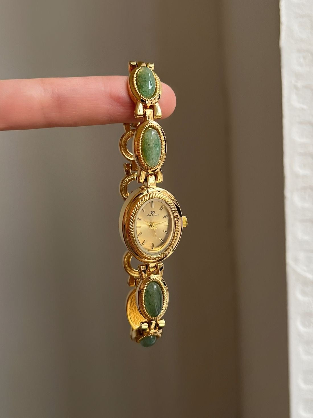 Vintage Rado Gold-Tone Watch with Emerald Accents – Timeless Elegance