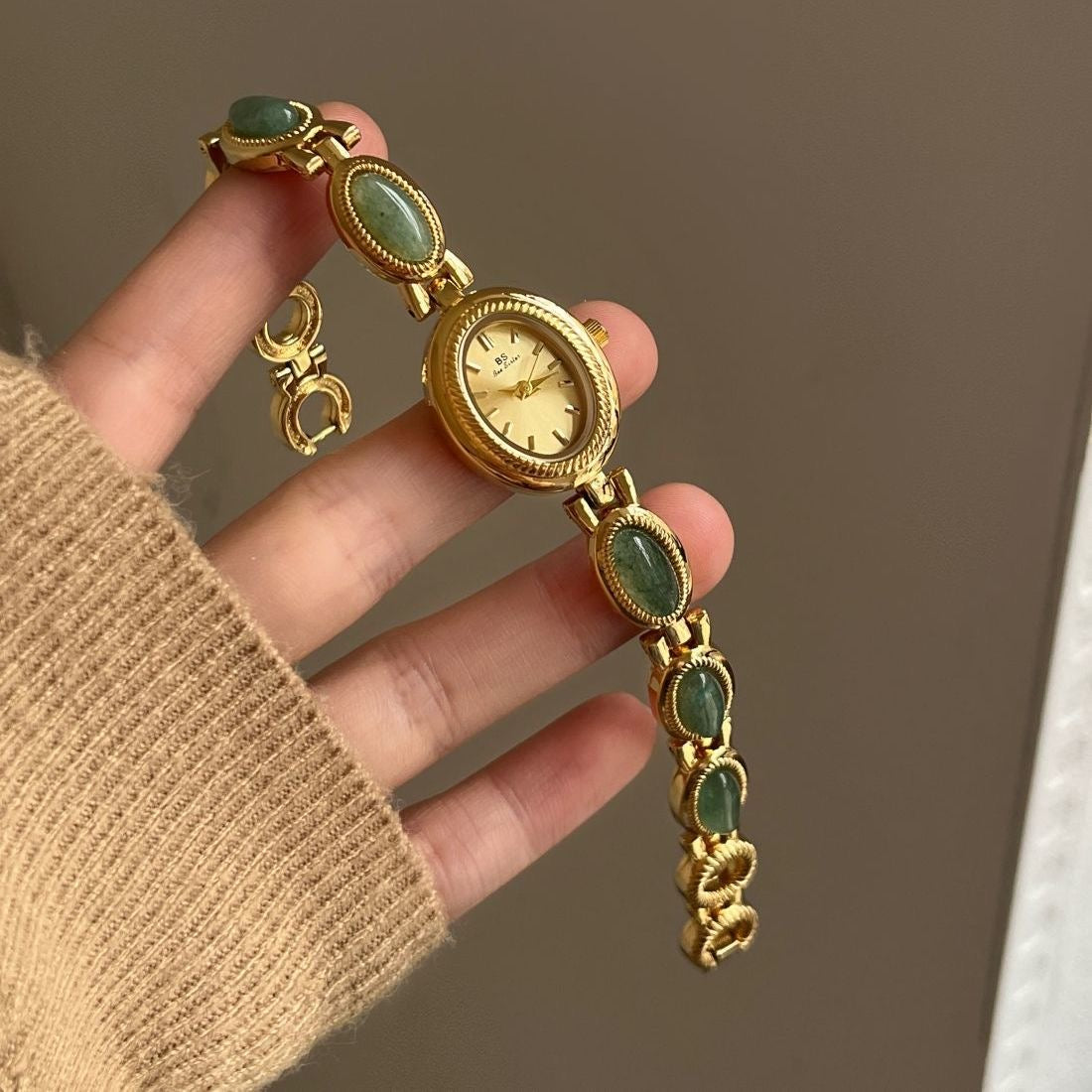 Vintage Rado Gold-Tone Watch with Emerald Accents – Timeless Elegance