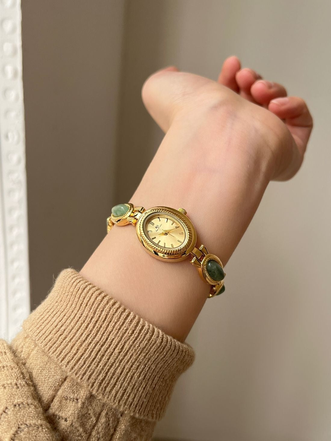 Vintage Rado Gold-Tone Watch with Emerald Accents – Timeless Elegance